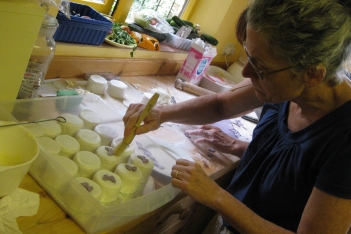 Sallie helping make wedding cakes