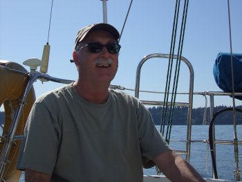 Greg at the tiller